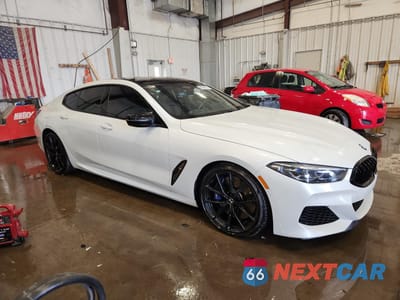 Czwarte zdjęcie samochodu z boku: 2020 BMW M850XI VIN:WBAGV8C03LBP48872 - miniatura