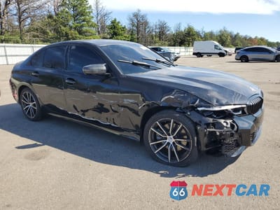 Czwarte zdjęcie samochodu z boku: 2022 BMW 330XI VIN:3MW5R7J05N8C70306 - miniatura