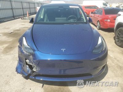 Piąte zdjęcie samochodu w środku: 2023 TESLA MODEL Y VIN:7SAYGDEE9PF666346 - miniatura