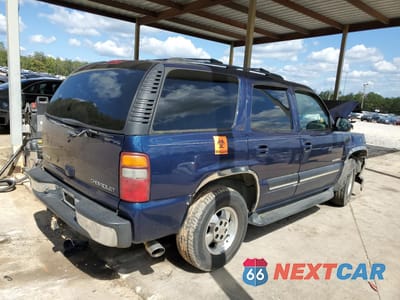 Trzecie zdjęcie samochodu z tyłu: 2001 CHEVROLET TAHOE C1500 VIN:1GNEC13T91R110977 - miniatura