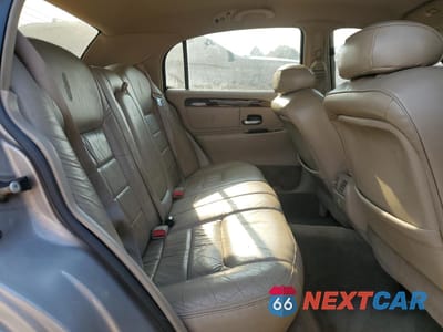 Zdjęcie 10 z 12 samochodu: 2000 LINCOLN TOWN CAR SIGNATURE VIN:1LNHM82WXYY770304 - miniatura