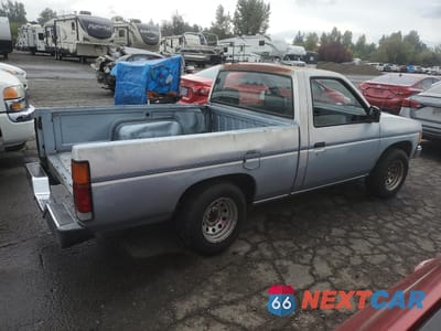 Trzecie zdjęcie samochodu z tyłu: 1991 NISSAN TRUCK SHORT WHEELBASE VIN:1N6SD11SXMC311083 - miniatura