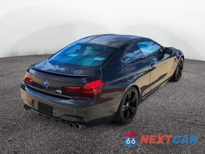 Czwarte zdjęcie samochodu z boku: 2017 BMW M6 VIN:WBS6J9C37HD934XXX - miniatura