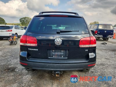 Zdjęcie 6 z 13 samochodu: 2004 VOLKSWAGEN TOUAREG 3.2 VIN:WVGBC67L24D023910 - miniatura