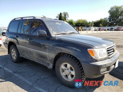 Czwarte zdjęcie samochodu z boku: 1999 TOYOTA LAND CRUISER VIN:JT3HT05J8X0062224 - miniatura