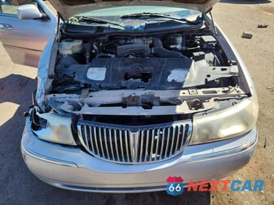 Zdjęcie 11 z 14 samochodu: 1999 LINCOLN TOWN CAR CARTIER VIN:1LNHM83W7XY621331 - miniatura