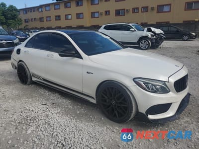 Czwarte zdjęcie samochodu z boku: 2016 MERCEDES-BENZ C 450 4MATIC AMG VIN:55SWF6EB1GU137383 - miniatura
