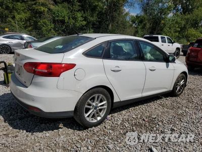 Trzecie zdjęcie samochodu z tyłu: 2016 FORD FOCUS SE VIN:1FADP3F26GL236111 - miniatura