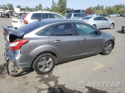 Trzecie zdjęcie samochodu z tyłu: 2012 FORD FOCUS SE VIN:1FAHP3F22CL140102 - miniatura