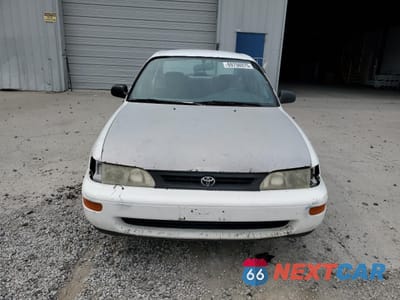 Piąte zdjęcie samochodu w środku: 1994 TOYOTA COROLLA LE VIN:1NXAE09B7RZ196711 - miniatura