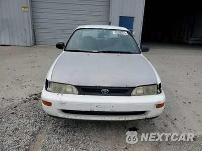 Piąte zdjęcie samochodu w środku: 1994 TOYOTA COROLLA LE VIN:1NXAE09B7RZ196711 - miniatura