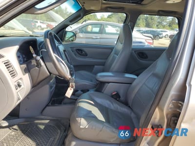 Zdjęcie 7 z 12 samochodu: 2001 FORD ESCAPE XLT VIN:1FMCU04121KB60354 - miniatura