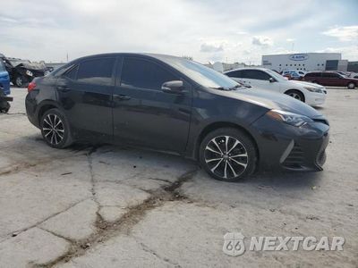 Czwarte zdjęcie samochodu z boku: 2018 TOYOTA COROLLA L VIN:5YFBURHE2JP758821 - miniatura