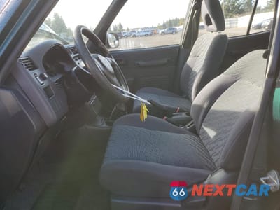 Zdjęcie 7 z 16 samochodu: 1999 TOYOTA RAV4 VIN:JT3HP10V1X7110075 - miniatura