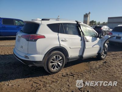 Trzecie zdjęcie samochodu z tyłu: 2016 TOYOTA RAV4 HV XLE VIN:JTMRJREV9GD011482 - miniatura