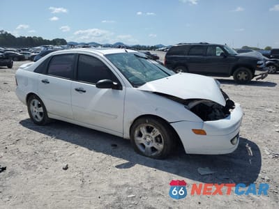 Czwarte zdjęcie samochodu z boku: 2003 FORD FOCUS ZTS VIN:1FAFP38353W265056 - miniatura