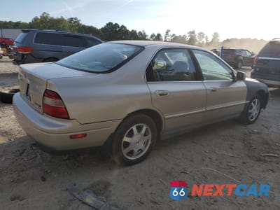 Trzecie zdjęcie samochodu z tyłu: 1995 HONDA ACCORD EX VIN:1HGCD5659SA131637 - miniatura