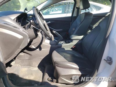 Zdjęcie 7 z 12 samochodu: 2012 FORD FOCUS TITANIUM VIN:1FAHP3J22CL351582 - miniatura
