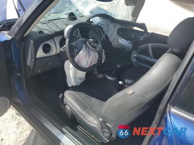 Zdjęcie 8 z 12 samochodu: 2003 MINI COOPER VIN:WMWRC33483TC47915 - miniatura