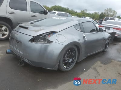Trzecie zdjęcie samochodu z tyłu: 2012 NISSAN 370Z BASE VIN:JN1AZ4EH0CM564375 - miniatura