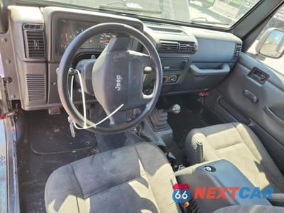 Zdjęcie 8 z 12 samochodu: 2004 JEEP WRANGLER / TJ SPORT VIN:1J4FA49S14P757130 - miniatura