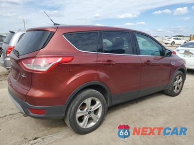Trzecie zdjęcie samochodu z tyłu: 2014 FORD ESCAPE SE VIN:1FMCU9GX1EUB25822 - miniatura