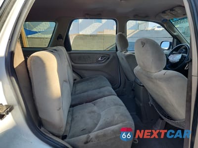 Zdjęcie 11 z 14 samochodu: 2002 MAZDA TRIBUTE LX VIN:4F2YU09102KM51326 - miniatura