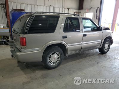 Trzecie zdjęcie samochodu z tyłu: 1999 GMC JIMMY VIN:1GKDT13W6X2514954 - miniatura