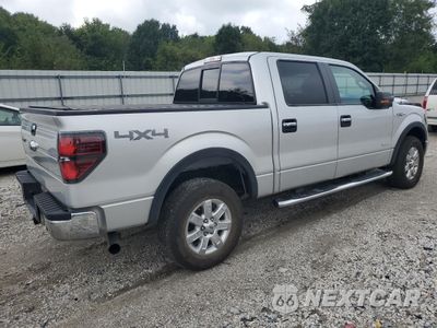 Trzecie zdjęcie samochodu z tyłu: 2014 FORD F150 SUPERCREW VIN:1FTFW1ET5EFB91663 - miniatura