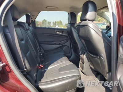 Zdjęcie 11 z 14 samochodu: 2021 FORD EDGE TITANIUM VIN:2FMPK4K96MBA27134 - miniatura