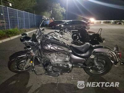 Trzecie zdjęcie samochodu z tyłu: 2003 KAWASAKI VN1600 A1 VIN:JKBVNKA133A002291 - miniatura