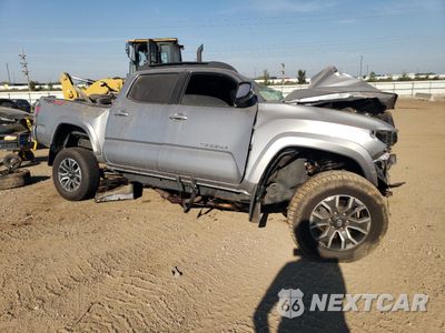 Czwarte zdjęcie samochodu z boku: 2021 TOYOTA TACOMA DOUBLE CAB VIN:3TMDZ5BN8MM118233 - miniatura
