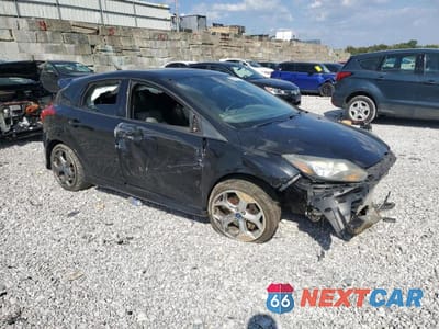 Czwarte zdjęcie samochodu z boku: 2013 FORD FOCUS ST VIN:1FADP3L93DL157055 - miniatura