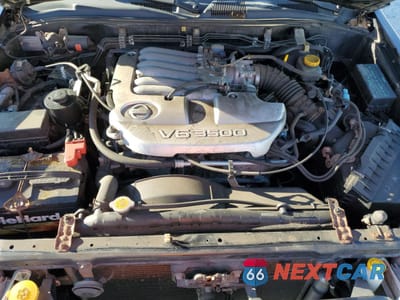 Zdjęcie 12 z 15 samochodu: 2002 NISSAN PATHFINDER LE VIN:JN8DR09Y42W711818 - miniatura