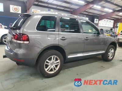 Trzecie zdjęcie samochodu z tyłu: 2009 VOLKSWAGEN TOUAREG 2 V6 VIN:WVGBE77L19D012372 - miniatura