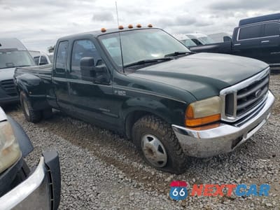 Czwarte zdjęcie samochodu z boku: 1999 FORD F350 SUPER DUTY VIN:1FTWX32F5XEC39940 - miniatura