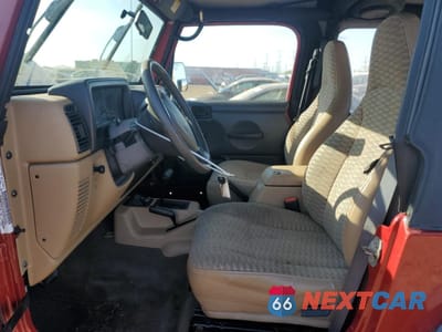 Zdjęcie 7 z 14 samochodu: 1999 JEEP WRANGLER / TJ SPORT VIN:1J4FY19S8XP480961 - miniatura