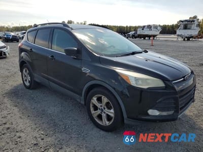 Czwarte zdjęcie samochodu z boku: 2016 FORD ESCAPE SE VIN:1FMCU0G93GUC19975 - miniatura