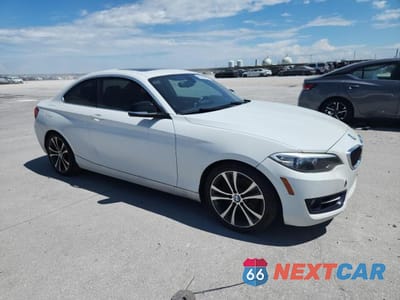 Czwarte zdjęcie samochodu z boku: 2015 BMW 228 I VIN:WBA1F5C55FV256473 - miniatura