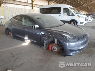 Czwarte zdjęcie samochodu z boku: 2021 TESLA MODEL 3 VIN:5YJ3E1EC1MF015704 - miniatura