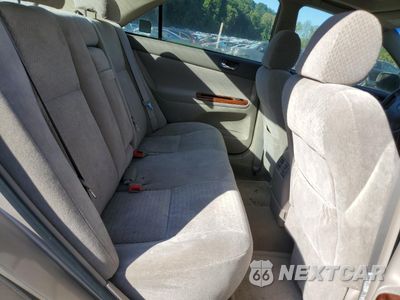 Zdjęcie 10 z 12 samochodu: 2004 TOYOTA CAMRY LE VIN:4T1BF32K64U587435 - miniatura