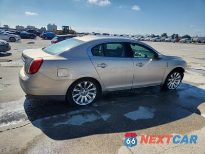 Trzecie zdjęcie samochodu z tyłu: 2009 LINCOLN MKS VIN:1LNHM93R69G625248 - miniatura
