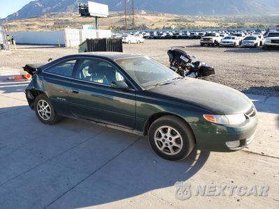Czwarte zdjęcie samochodu z boku: 1999 TOYOTA CAMRY SOLARA SE VIN:2T1CF22P7XC136370 - miniatura