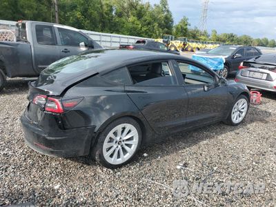 Trzecie zdjęcie samochodu z tyłu: 2021 TESLA MODEL 3 VIN:5YJ3E1EA5MF987868 - miniatura