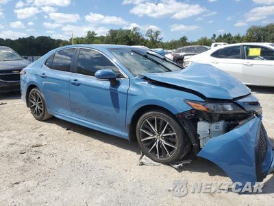 Czwarte zdjęcie samochodu z boku: 2023 TOYOTA CAMRY SE NIGHT SHADE VIN:4T1G11AK4PU098014 - miniatura