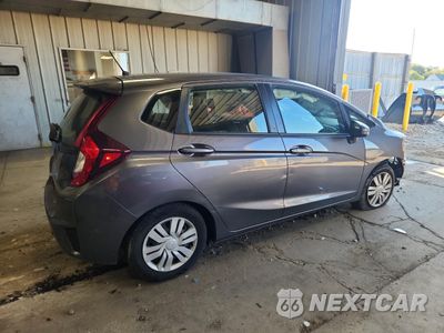 Trzecie zdjęcie samochodu z tyłu: 2016 HONDA FIT LX VIN:JHMGK5H5XGS014989 - miniatura