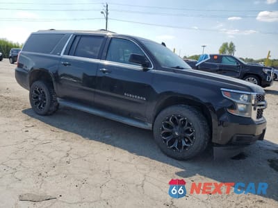 Czwarte zdjęcie samochodu z boku: 2015 CHEVROLET SUBURBAN K1500 LS VIN:1GNSKHKCXFR509193 - miniatura