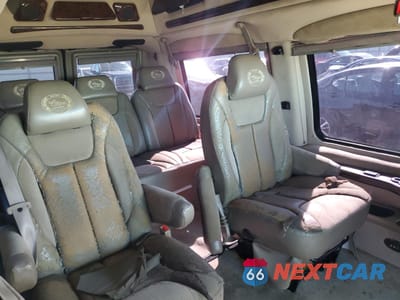 Zdjęcie 11 z 16 samochodu: 2004 FORD E150 CHATE VIN:1FDRE14LX4HA54850 - miniatura