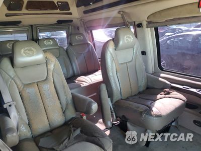 Zdjęcie 11 z 16 samochodu: 2004 FORD E150 CHATE VIN:1FDRE14LX4HA54850 - miniatura
