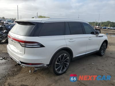 Trzecie zdjęcie samochodu z tyłu: 2023 LINCOLN AVIATOR RESERVE VIN:5LM5J7XC3PGL15123 - miniatura